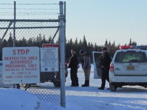 Leroy B. Dick, Jr., 42, in custody at the Dillingham airport. Dick is facing first degree murder charges for the killing of Manokotak VPSO Thomas Madole. Photo by Jason Sear, KDLG - Dillingham