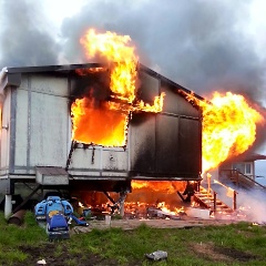 Nunam Iqua Home on Fire. Photo courtesy of AST.
