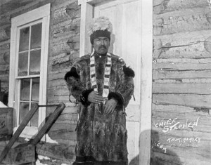  Chief Stephan wearing dentalium bandolier, headdress and ground squirrel parka, Knik, Alaska, c. 1907. Image credit: Anchorage Museum. 