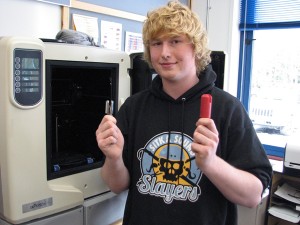 Thor uses a 3D printer in Sitka’s state-of-art Design and Fabrication Lab. Photo by Robert Woolsey, KCAW - Sitka.