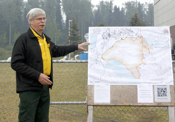 Public Information Officer Jim Schwarber briefs the media about the Funny Rover fire on Tuesday morning. (Photo by Josh Edge, APRN - Anchorage)