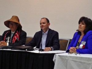 NCAI President Brian Cladoosby, middle, BIA undersecretary for Indian Affairs Kevin Washburn, middle, and NCAI executive director Jacqueline Pata, left. (Photo by Lori Townsend, APRN - Anchorage)