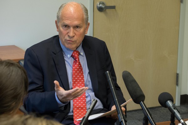 Gov. Bill Walker discusses a tax credit veto with the press, July 1, 2015. (Photo by Jeremy Hsieh/KTOO)