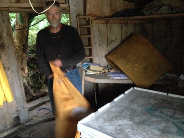 Sorting mail in the fish tote. Photo: Shady Grove Oliver/KBBI