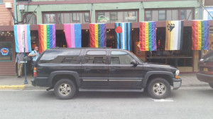 SEAGLA decordated the outside of the Imperial with various gradient flags from the LGBT community, including the pride, bisexual, transgender, leather, bear flags. Photo: Lakeidra Chavis/KTOO