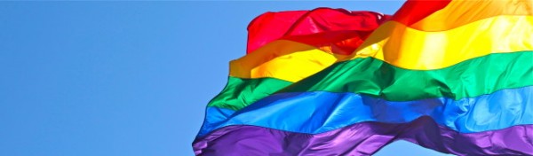 The Rainbow Flag is a symbol of LGBT pride. (Creative Commons photo by torbakhopper)