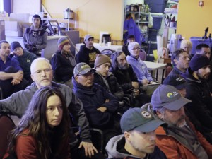Mushers, handlers and organizers attend the Kuskokwim 300 Musher’s Hall meeting Jan 14. (Photo by Chris Pike/ KYUK)