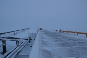 The five mile road from Alpine Central Facility to the CD5 drill site crosses four bridges, including the Nigliq Channel bridge, the longest on the North Slope. Photo: Rachel Waldholz/APRN