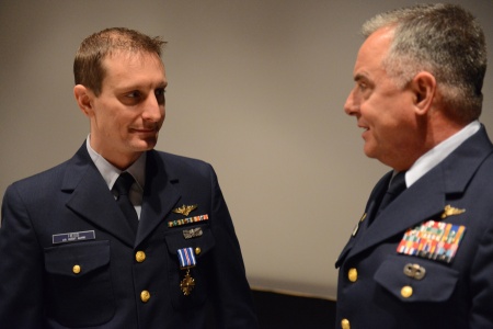 Hess (left) with Capt. Mark Morin, commanding officer of Air Station Kodiak. ( Phto courtesy of Lauren Steenson, U.S. Coast Guard)