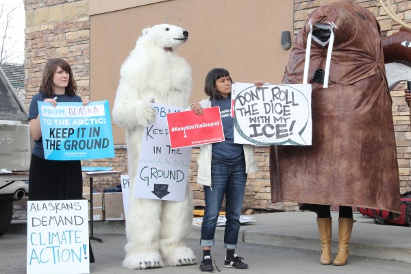 Frostpaw the Polar Bear joined protesters outside BOEM's meeting in Anchorage on April 5, 2016. The protesters argue that BOEM has not taken climate change into account when considering offshore leases. Photo: Rachel Waldholz/APRN