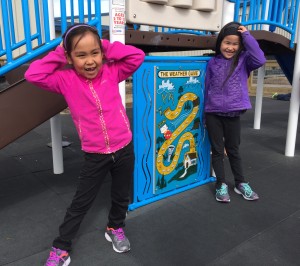 Chloe Lewis plays with her friend on the school playground in Kwigillingok. (Hillman/KSKA)