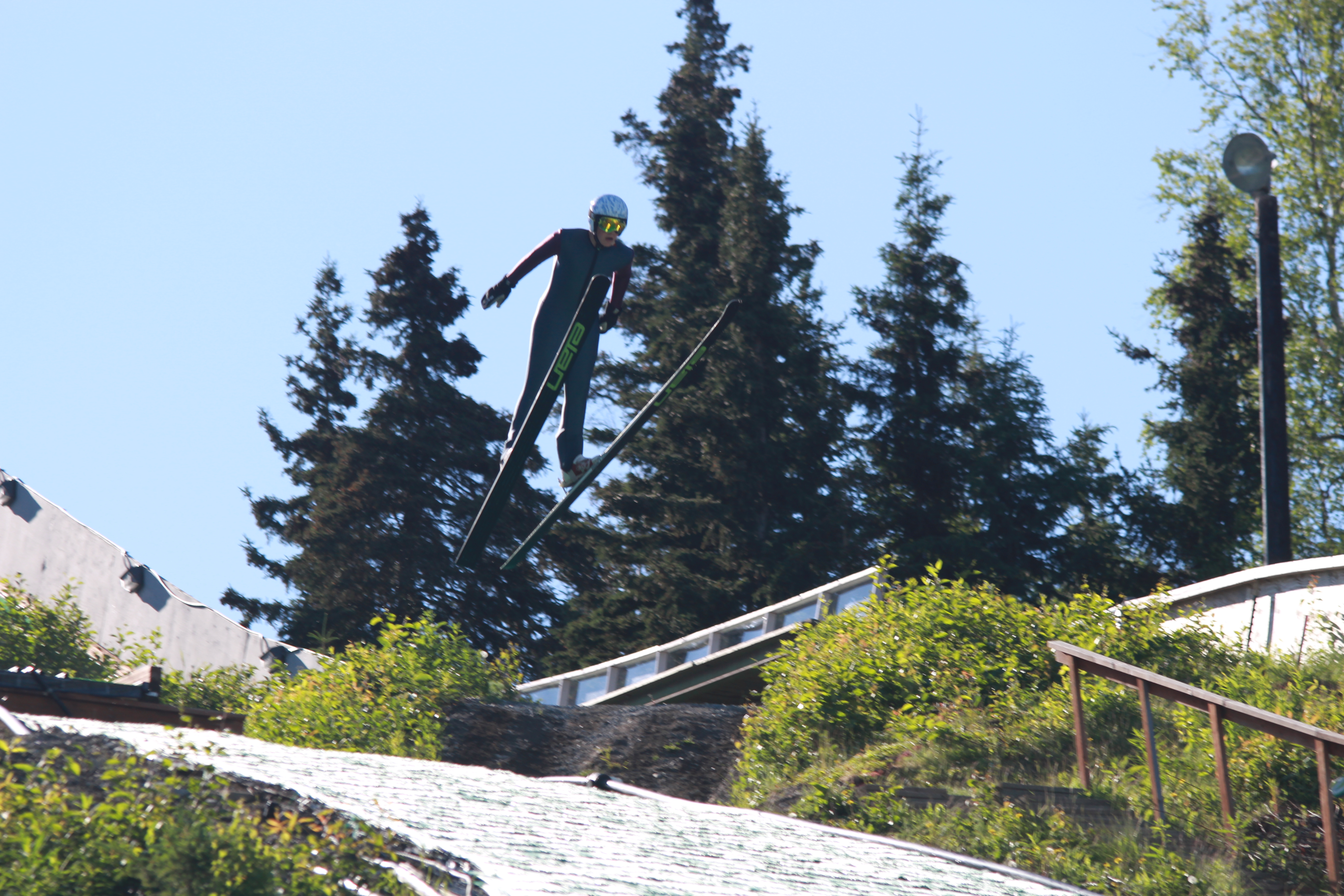 One of the skiers flies off the 40 meter ski jump. (Photo by Wesley Early, Alaska Public Media - Anchorage)