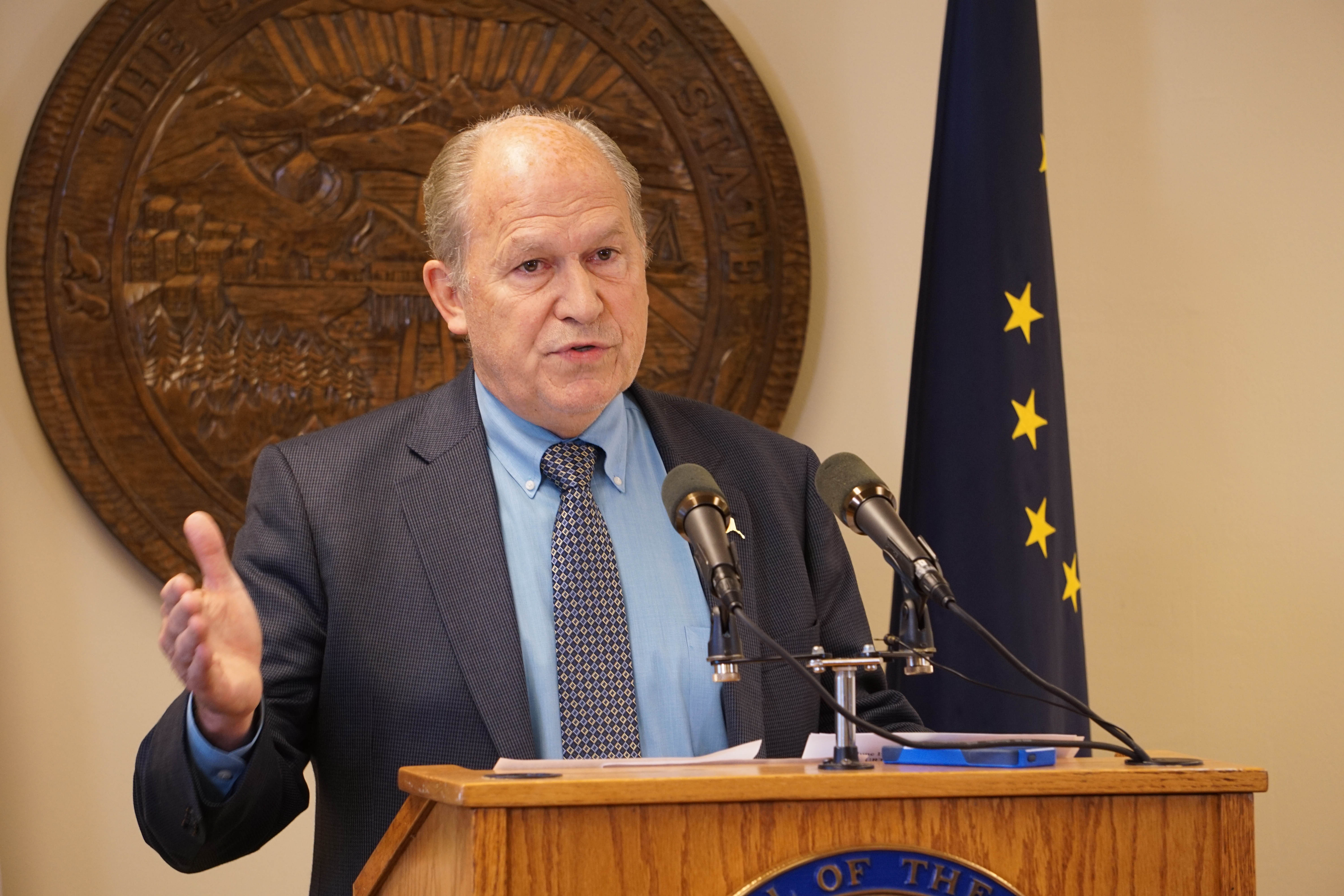 Gov. Bill Walker talks with reporters in his temporary offices in Juneau, June 19,2016. He had just called the legislature back for a fifth special session. (Photo by Jeremy Hsieh, KTOO - Juneau)