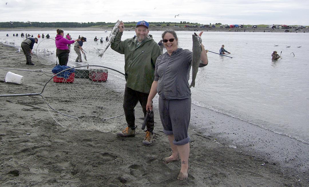 John Wentworth and Tracy Christal drove down from Talkeetna to participate in the Kasilof River personal-use dip net fishery last week. Though they live on the Big Su, Wentworth said the fish are better fresh from the ocean. (Photo by Jenny Neyman, KBBI - Homer)