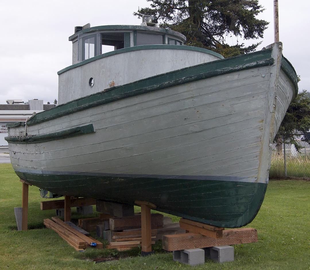 A Bristol Bay double-ender fishing boat is on display at the Kenai Historical Society's office, across the parking lot from the Kenai Visitors and Cultural Center. (Photo by Jenny Neyman, KBBI - Homer)