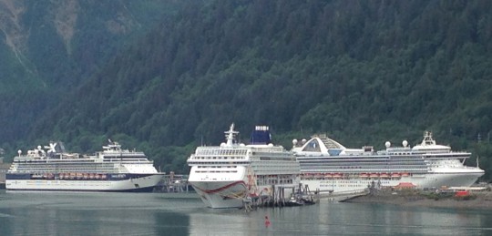 Three cruise ships dock in downtown Juneau July 14, at the height of the tourist season. (Photo by Ed Schoenfeld, CoastAlaska News)