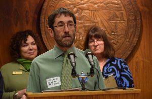 Former Alaska Mental Health Trust Executive Director Jeff Jessee tells reporters why he supports Gov. Bill Walker’s efforts to expand Medicaid at a press conference in the Capitol, March 17, 2015. (Photo by Skip Gray/360 North)
