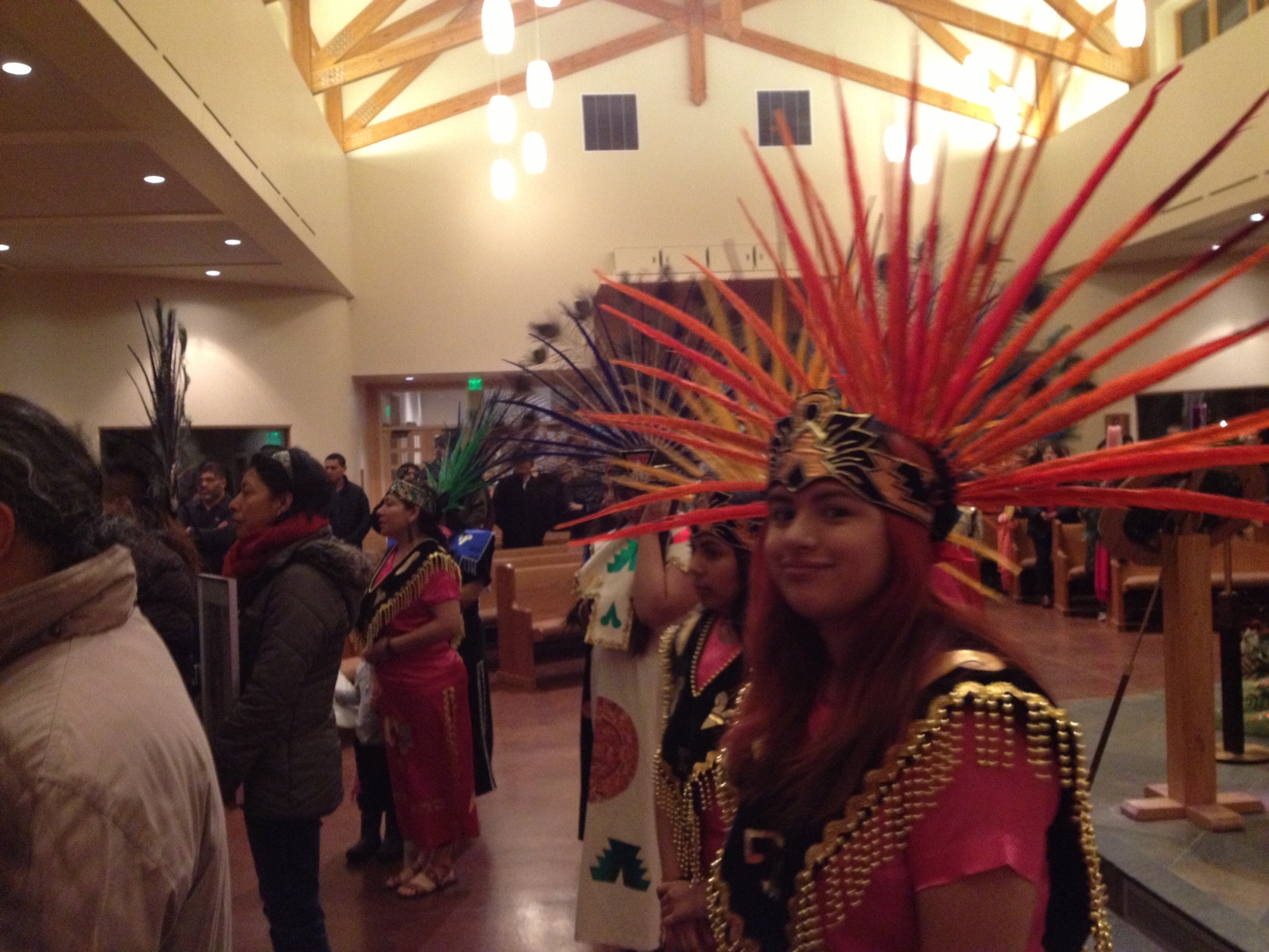 Aztec dancers at the celebration of La Senora de Guadalupe. (Photo by Ellen Lockyer - Alaska Public Media.