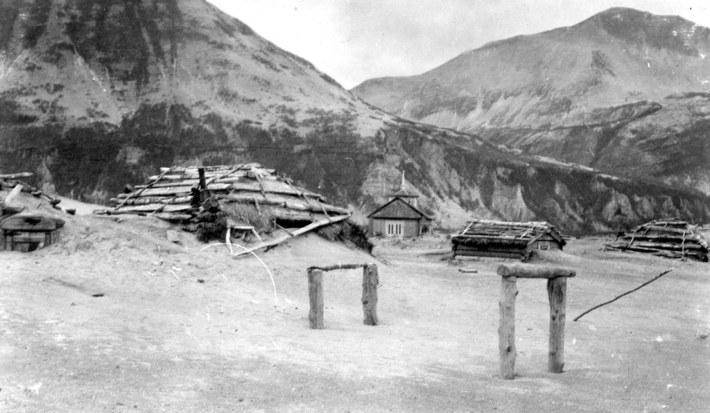A black and white photo of a village.