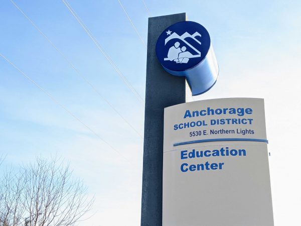 A sign says Anchorage School District.