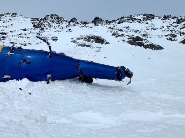 A crashed helicopter on an ice field