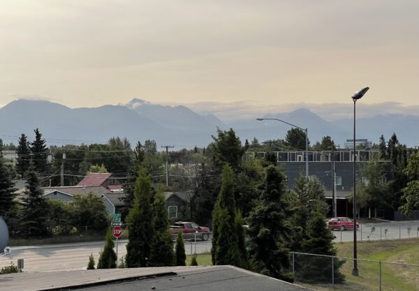 A haze falls over mountains in Anchorage.