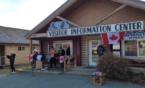 A band plays music outside of the Visitor Information Center.