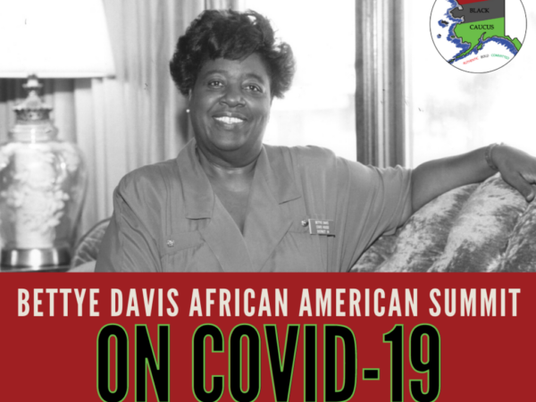 A sign says: Bettye Davis African American Summit on COVID-19