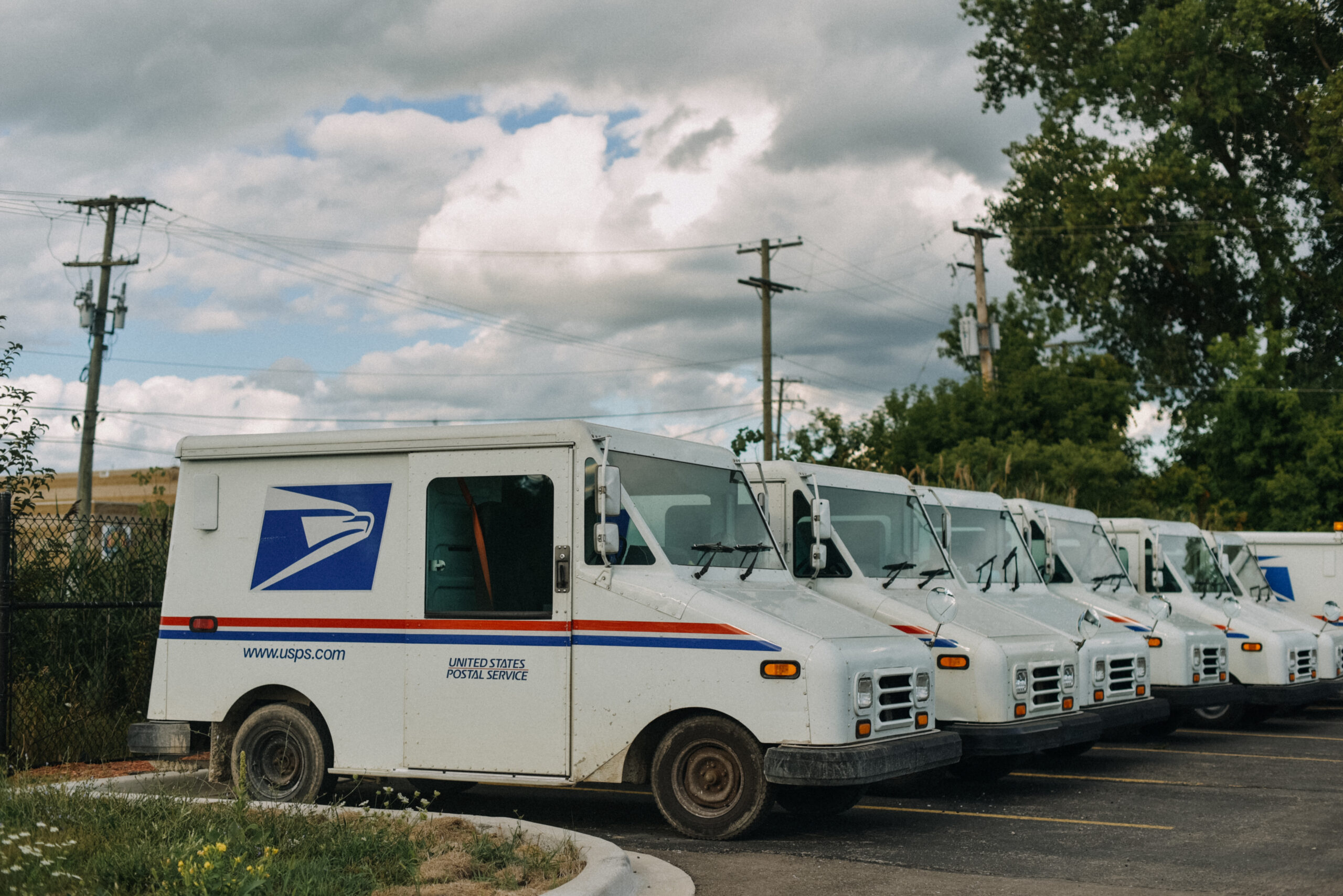 USPS truck parked in line
