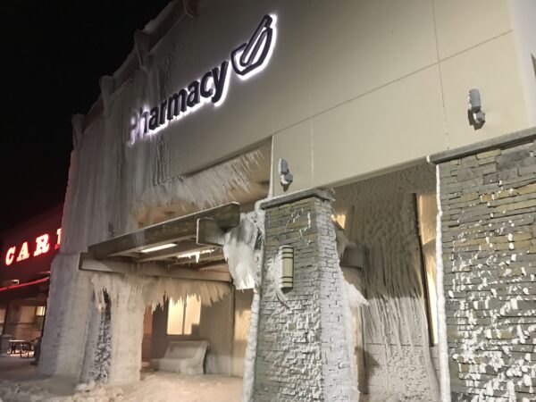 Ice covers the entrance of a store.