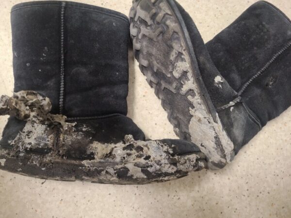 Boots charred at the bottom.