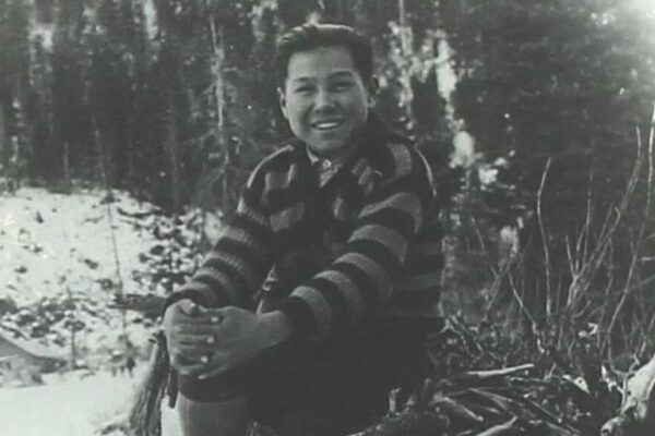 A black and white photo of a boy
