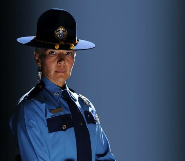 a woman in a troopers uniform