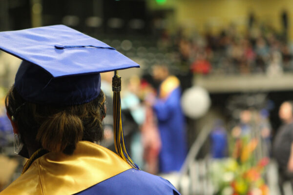 A Bartlett High School graduate waits to walk across the stage.